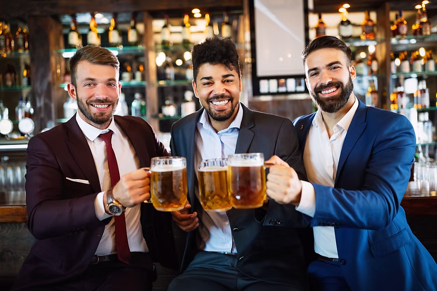Friends at the bar enjoying a Beer.jpg